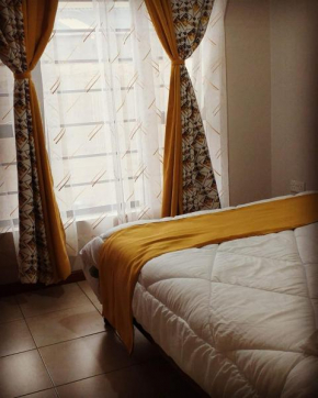 Susan's cozy studio apartment near JKIA